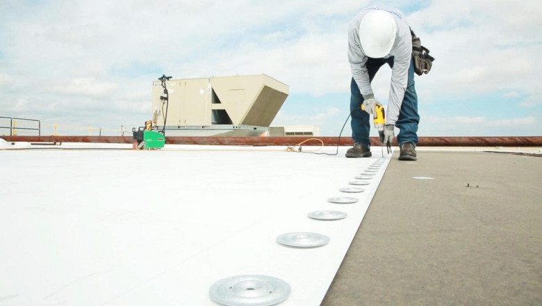 How Commercial Flat Roofing Services Help Cut Energy Bills